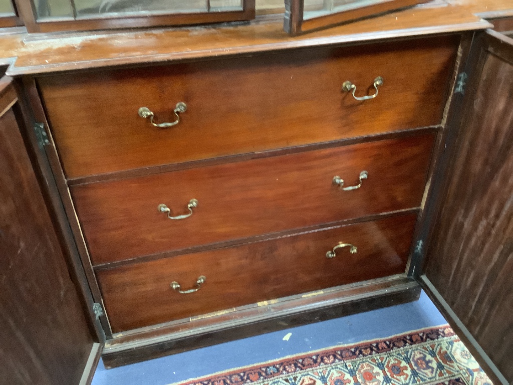 A George III mahogany breakfront library bookcase, length 232cm, depth 60cm, height 265cm